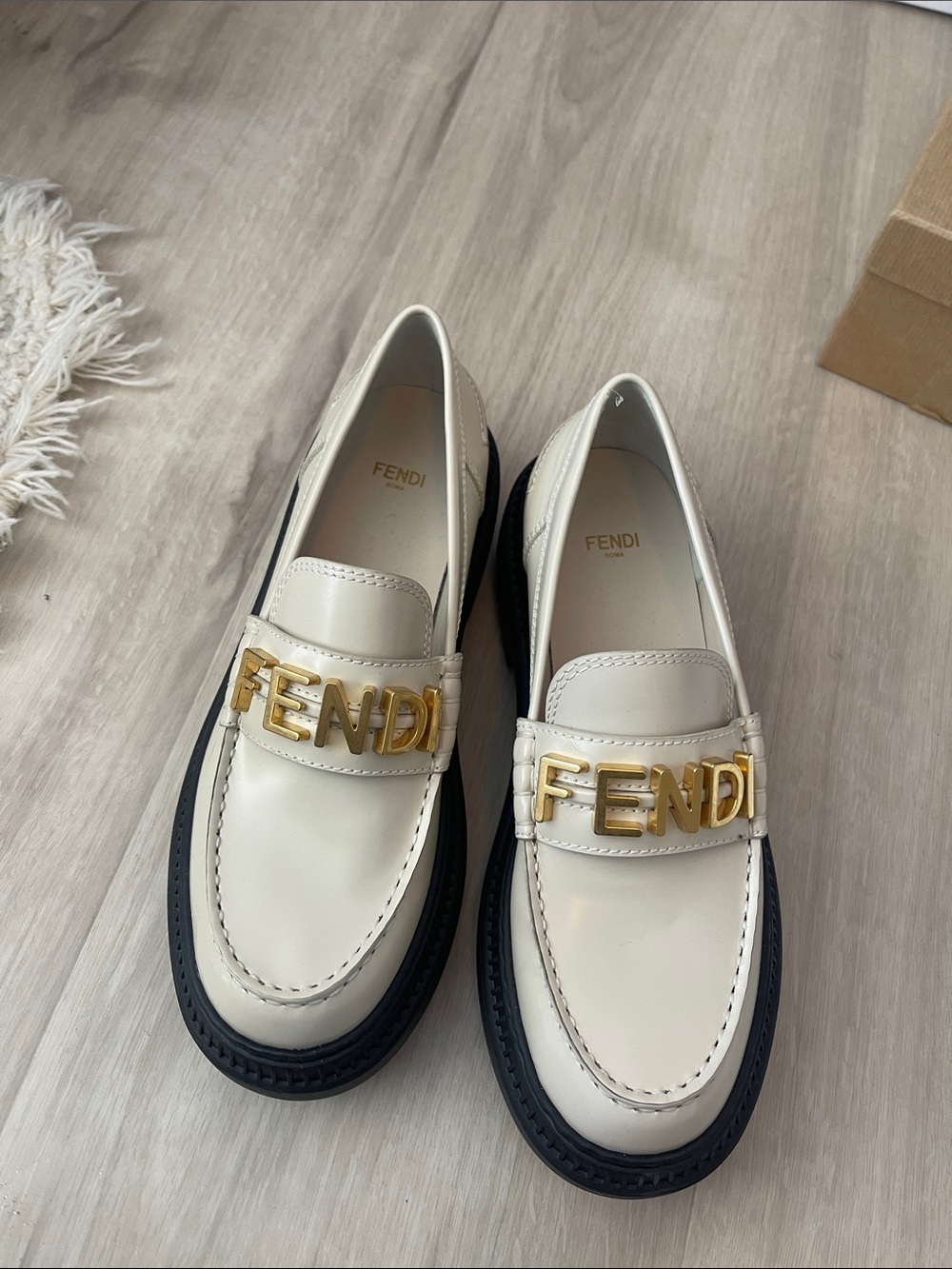 Fendi Cream Leather Logo-Embellished Loafers with Black Soles
